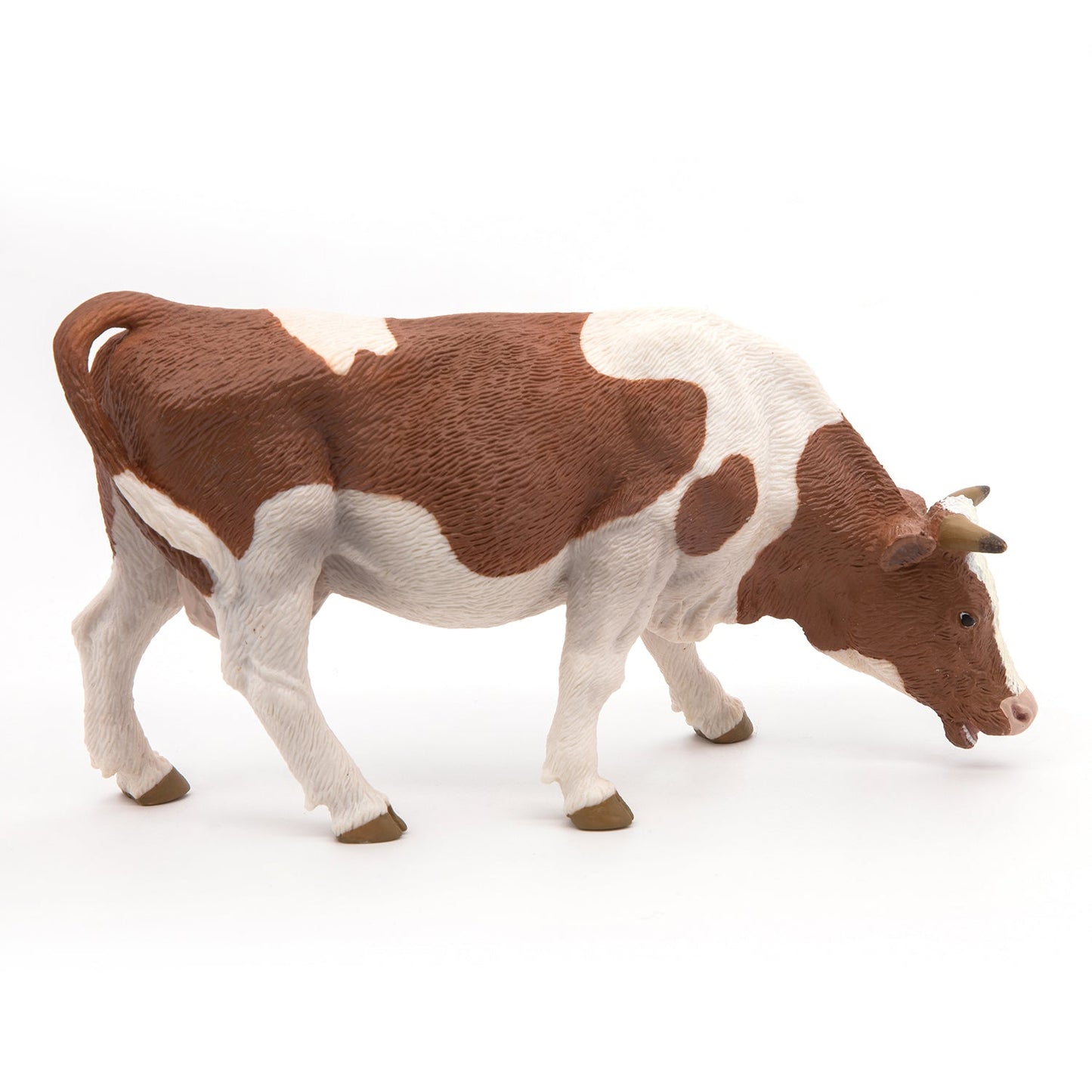 Figurine Vache simmental broutant