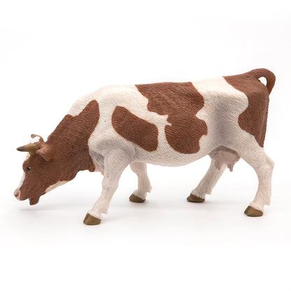 Figurine Vache simmental broutant