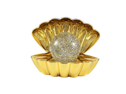 Goldene Muschelleuchte