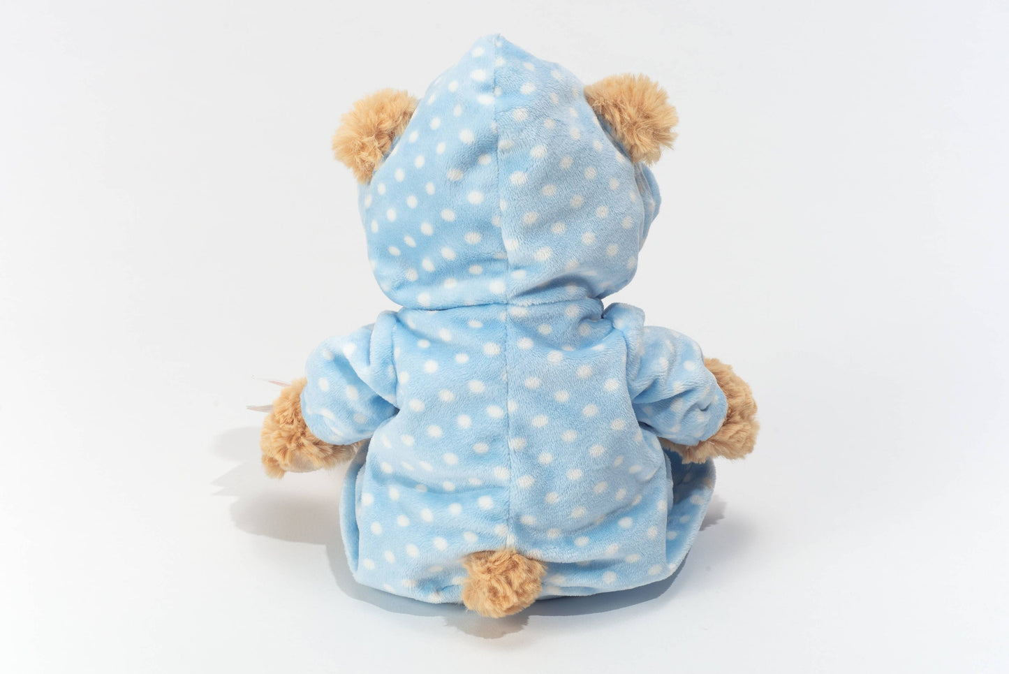 Teddybär im blauen Pyjama